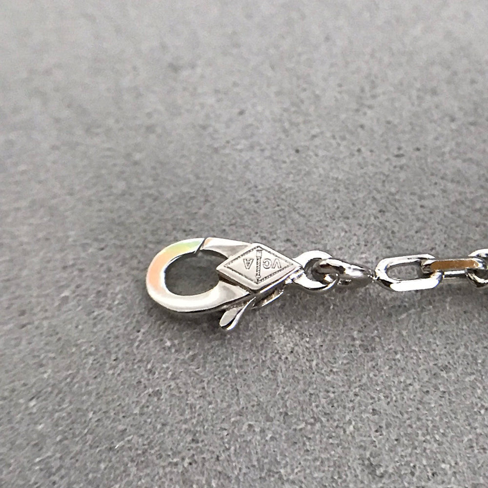 Armband mit Kleeblattmotiv, 5 Onyx- und Diamanten, Silber